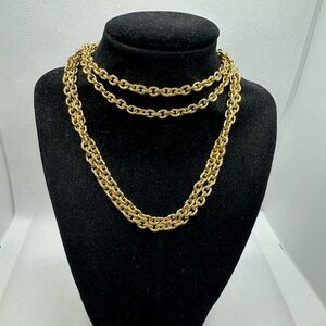 Beautiful signed Kramer long gold tone necklace